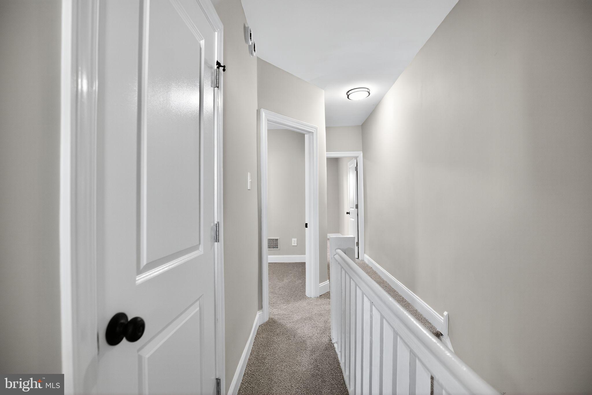 258 West Sheldon Street Philadelphia, PA 19120 - Photo 16 of 29 a view of a hallway with wooden floor