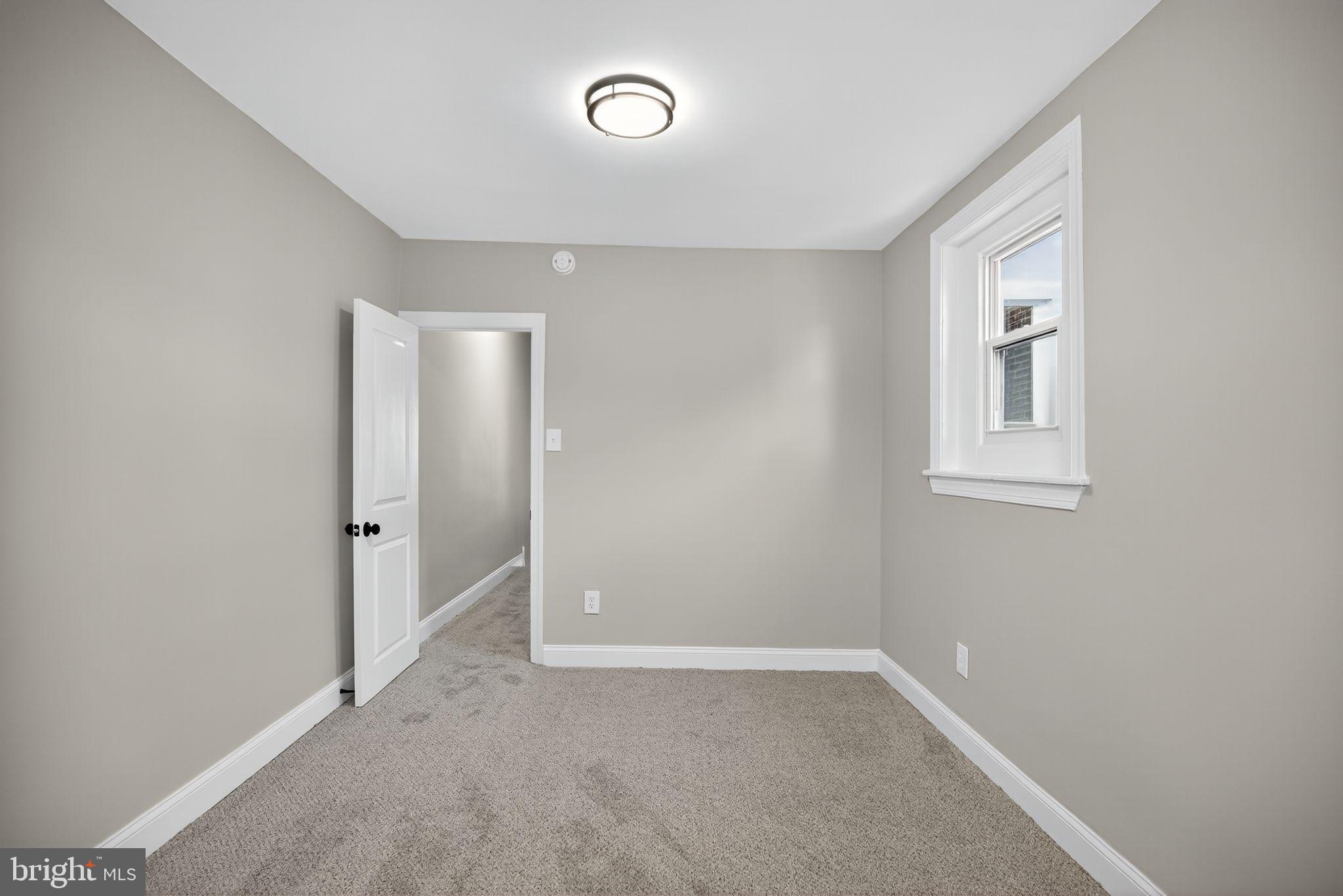 258 West Sheldon Street Philadelphia, PA 19120 - Photo 22 of 29 an empty room with windows and closet