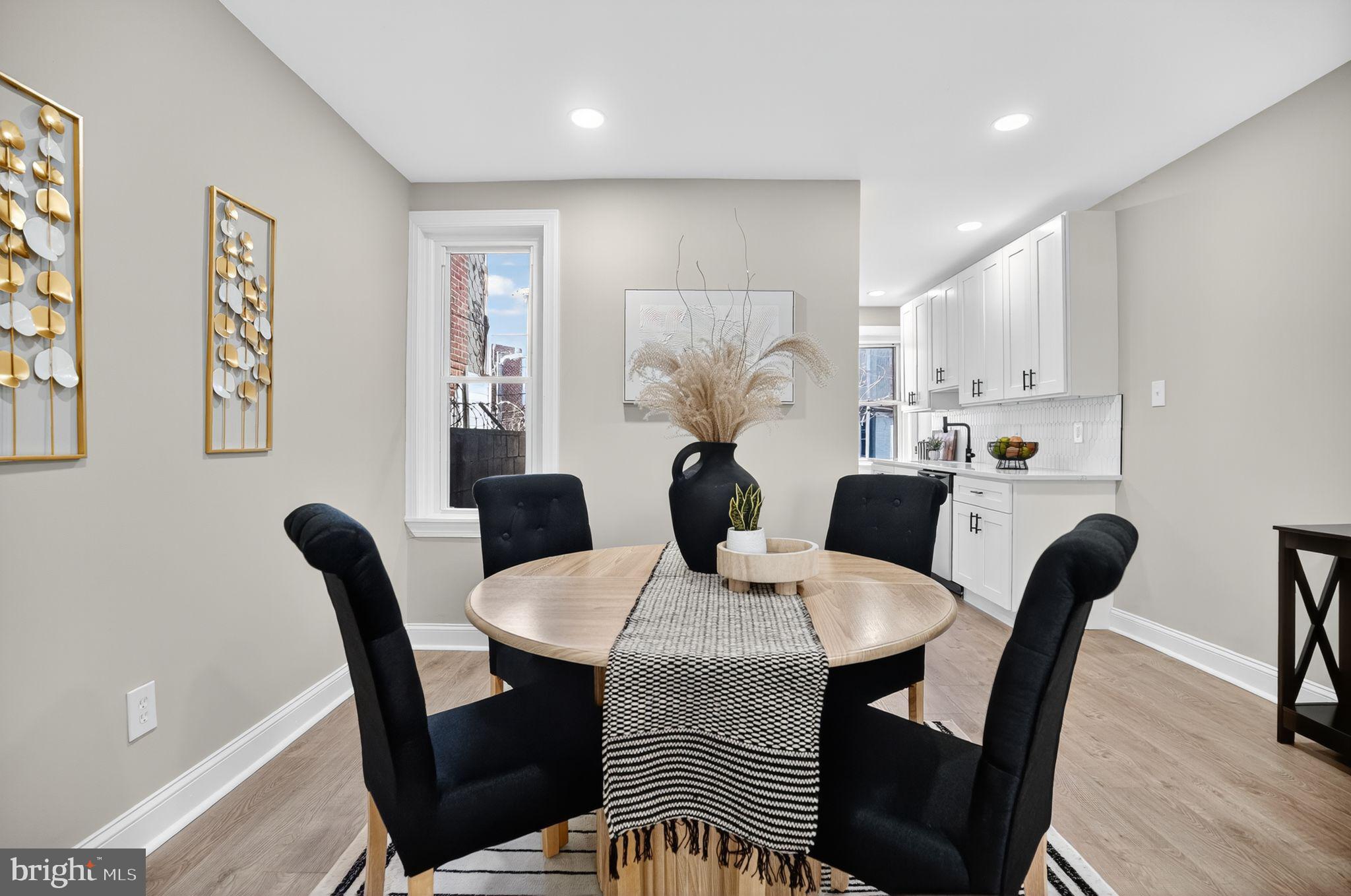 258 West Sheldon Street Philadelphia, PA 19120 - Photo 5 of 29 a dining room with furniture and wooden floor
