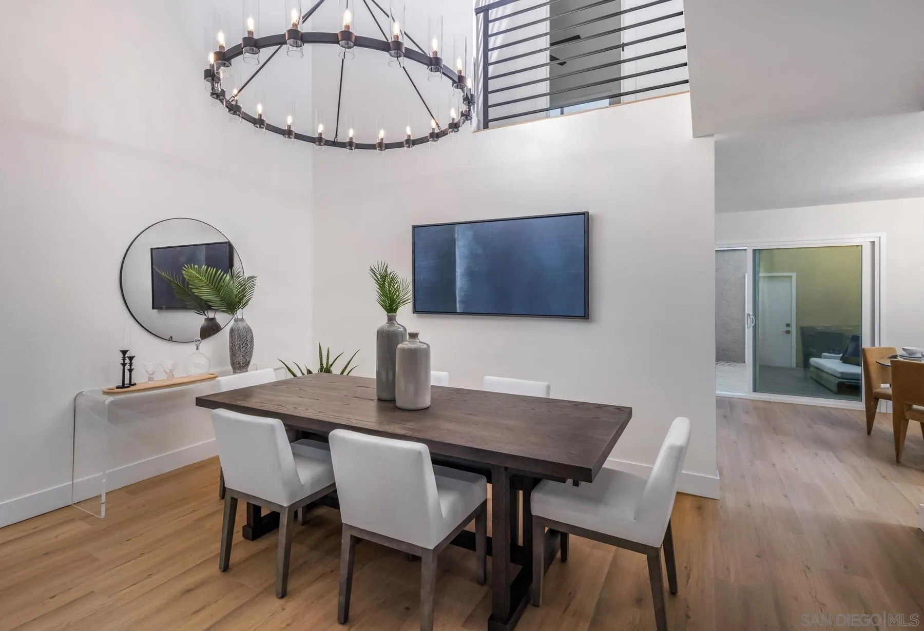 1986 Azure Way Encinitas, CA 92024 - Photo 6 of 20 a view of a dining room with furniture and wooden floor