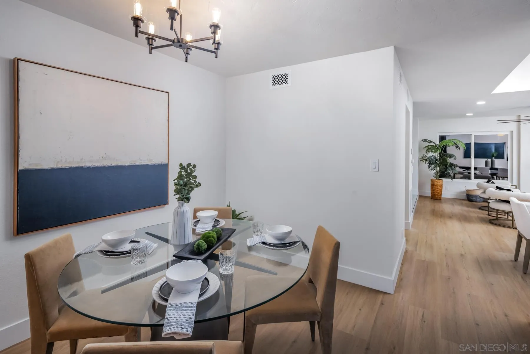 1986 Azure Way Encinitas, CA 92024 - Photo 8 of 20 a view of a dining room with furniture and wooden floor