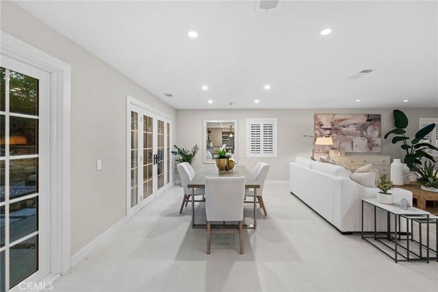 a kitchen with counter top space and stainless steel appliances