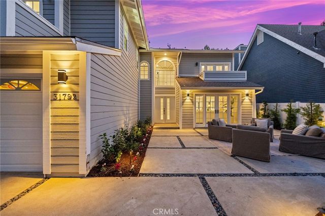 a front view of a building with seating space