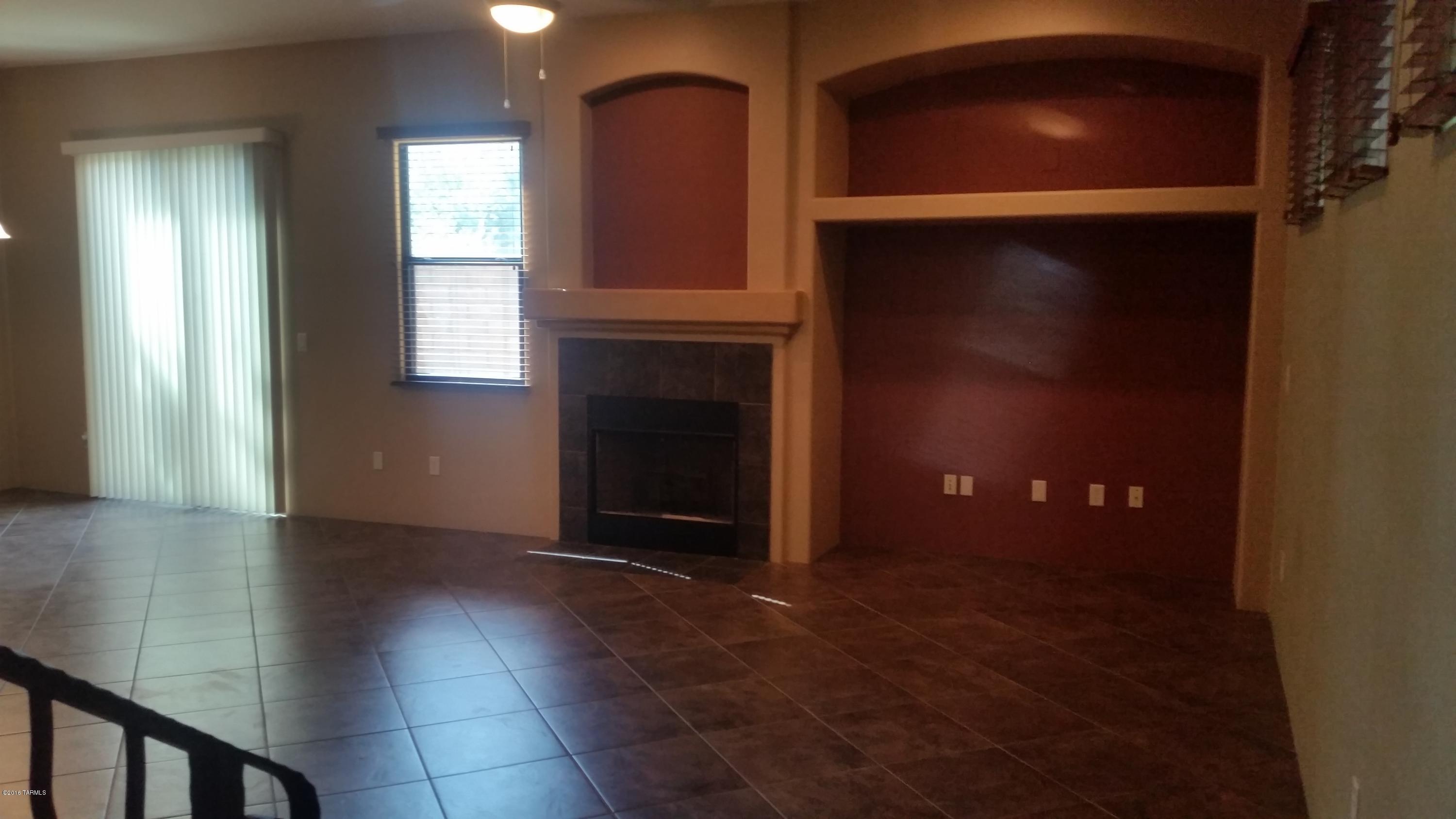 478 East Cedarvale Road Tucson, AZ 85704 - Photo 9 of 39 wooden floor in an empty room