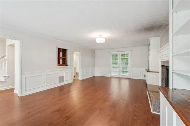 a view of livingroom with furniture wooden floor and window