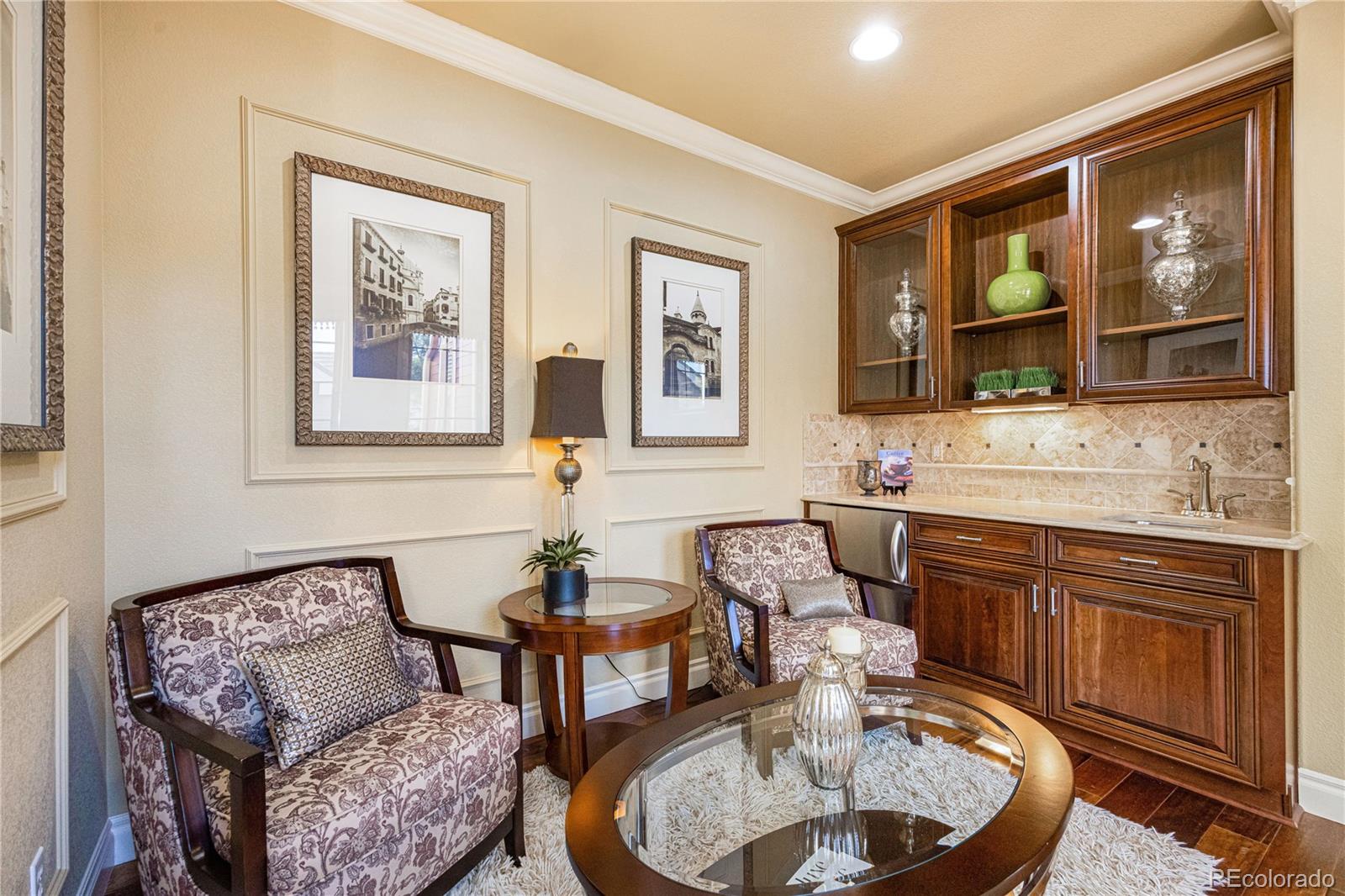 9132 Mornington Way Lone Tree, CO 80124 - Photo 20 of 44 a living room with furniture and window