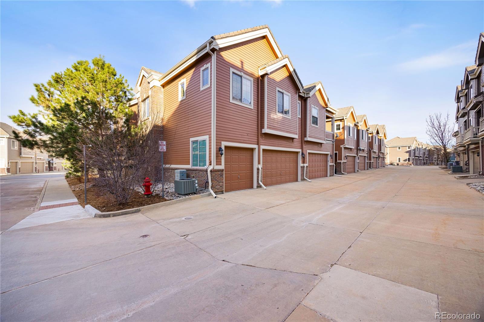 9132 Mornington Way Lone Tree, CO 80124 - Photo 36 of 44 a view of a house with a yard