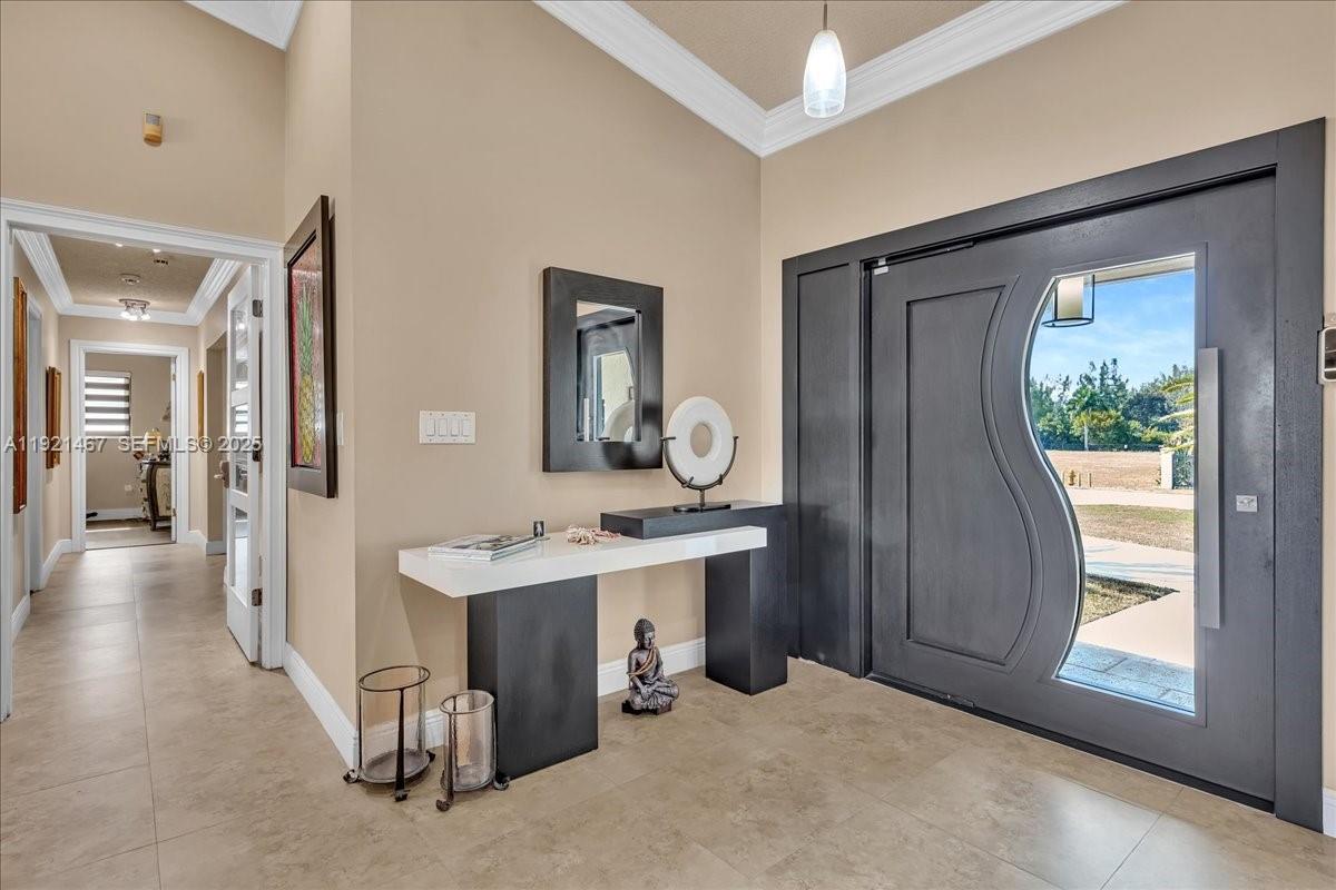 3801 Southwest 141st Avenue Miramar, FL 33027 - Photo 16 of 99 a view of a bathroom with sink mirror and window