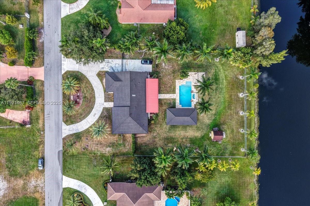 3801 Southwest 141st Avenue Miramar, FL 33027 - Photo 3 of 99 an aerial view of a house with outdoor space swimming pool outdoor seating and yard