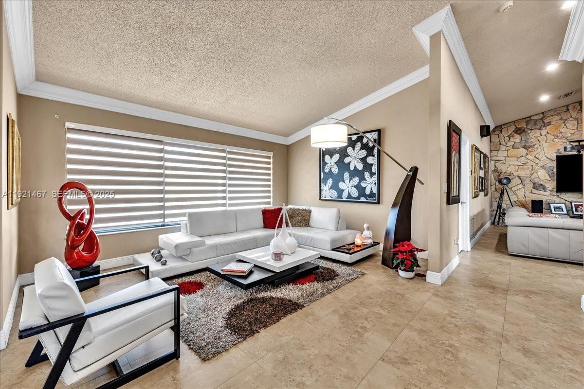 3801 Southwest 141st Avenue Miramar, FL 33027 - Photo 42 of 99 a bedroom with furniture and a window