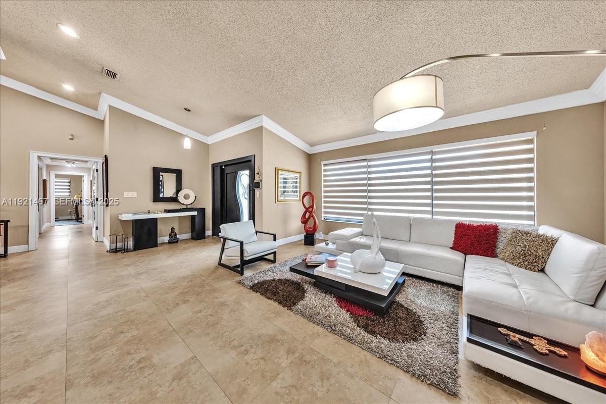 3801 Southwest 141st Avenue Miramar, FL 33027 - Photo 44 of 99 a living room with furniture and wooden floor