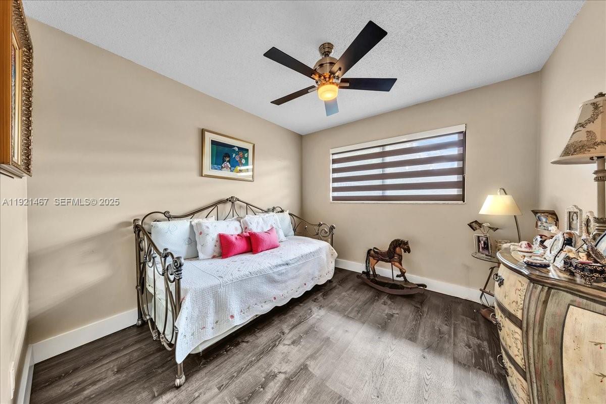 3801 Southwest 141st Avenue Miramar, FL 33027 - Photo 56 of 99 a living room with furniture and a wooden floor