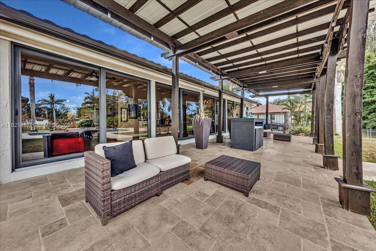 3801 Southwest 141st Avenue Miramar, FL 33027 - Photo 67 of 99 a view of living room with furniture and outdoor view