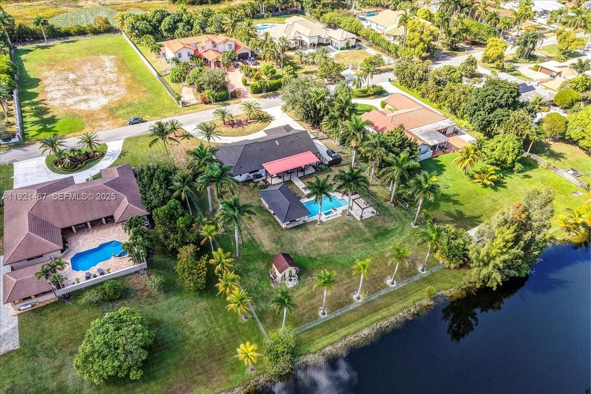 3801 Southwest 141st Avenue Miramar, FL 33027 - Photo 86 of 99 an aerial view of residential houses with outdoor space and street view