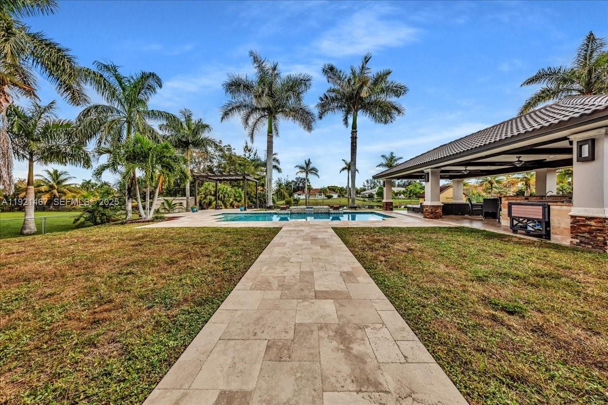 3801 Southwest 141st Avenue Miramar, FL 33027 - Photo 99 of 99 a view of outdoor space with palm trees