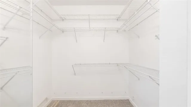 a view of a room with racks on the wall