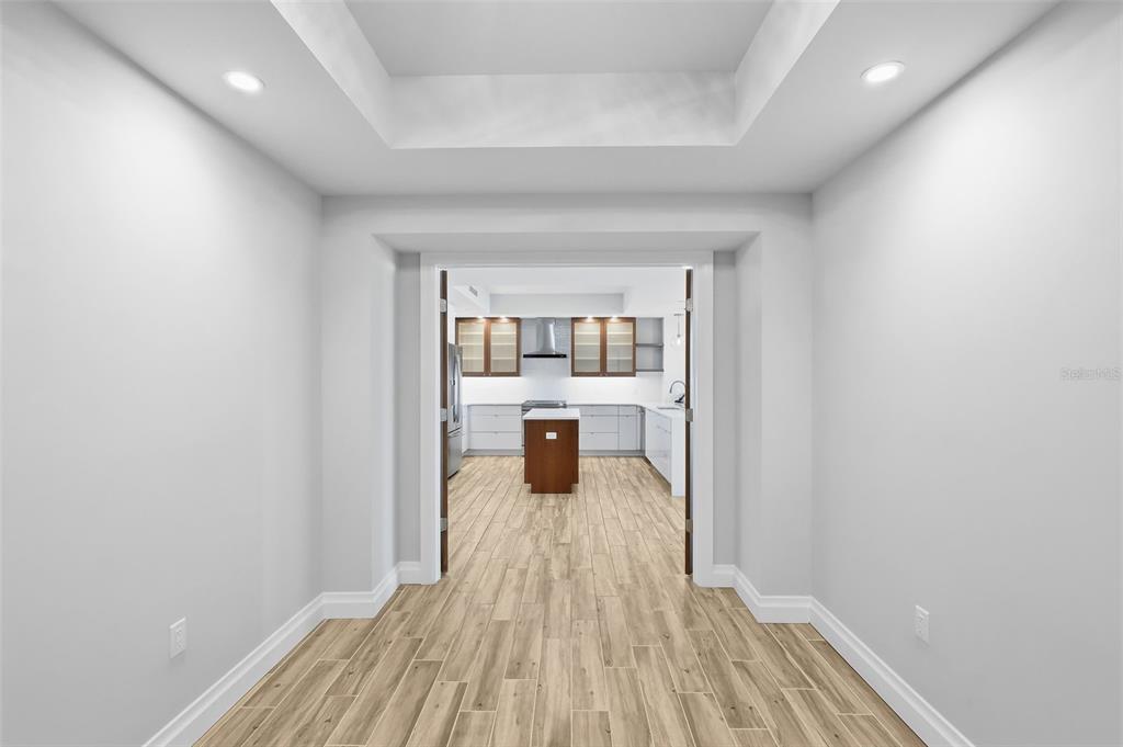 800 Collany Road, Unit 302 St. Petersburg, FL 33715 - Photo 30 of 66 a view of a room with wooden floor