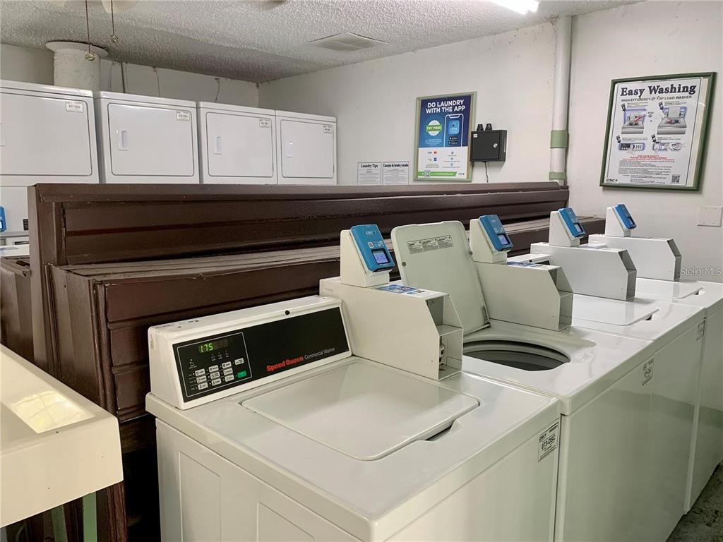 525 South Conway Road, Unit 189D Orlando, FL 32807 - Photo 18 of 19 a living room with furniture and a fireplace