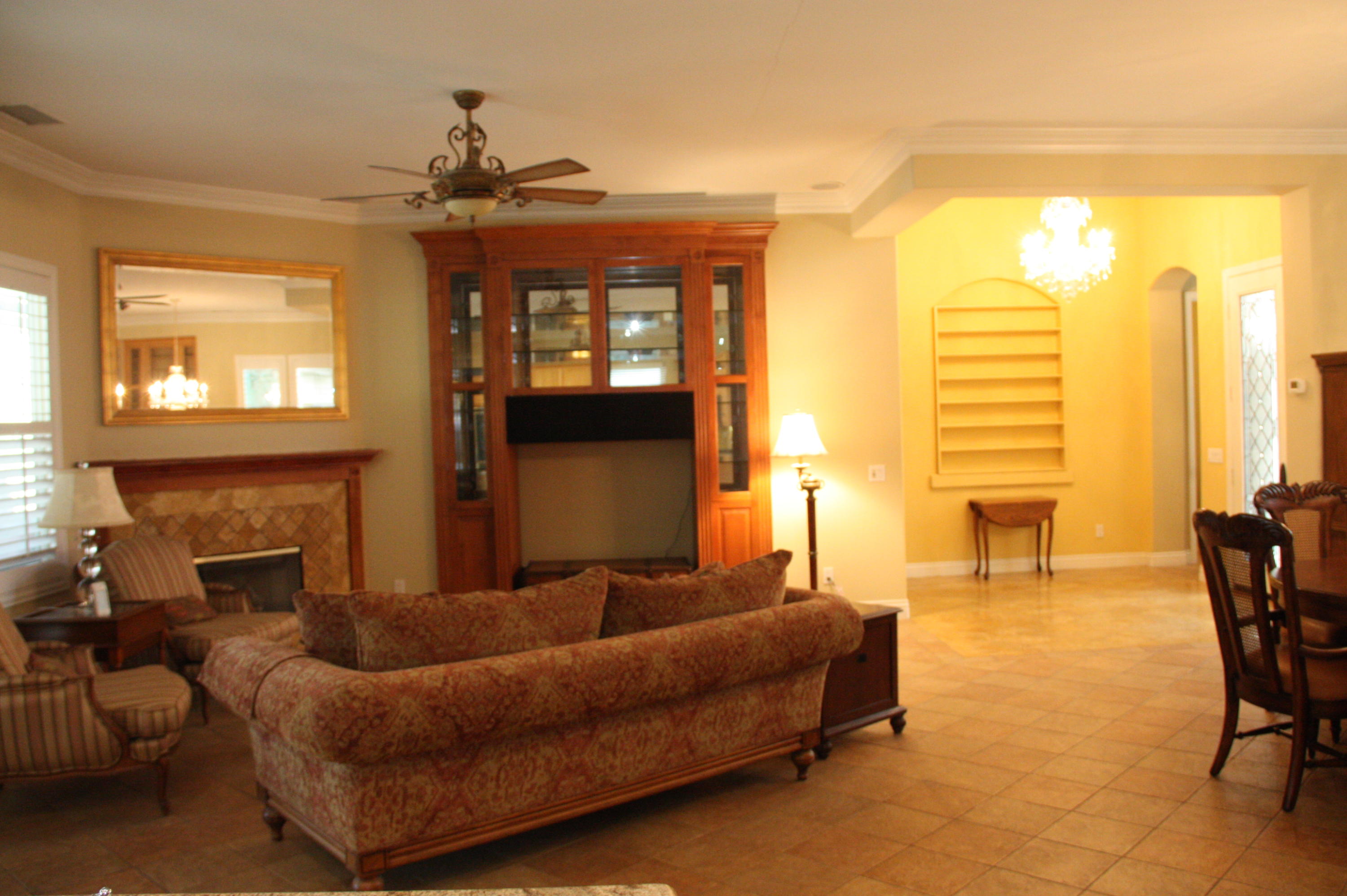 49475 Redford Way Indio, CA 92201 - Photo 21 of 58 a living room with furniture and a fireplace