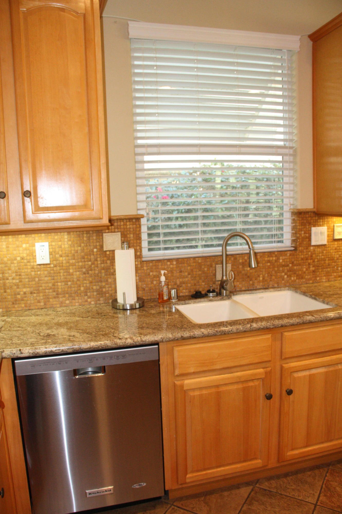49475 Redford Way Indio, CA 92201 - Photo 26 of 58 a kitchen with stainless steel appliances granite countertop a sink and a window