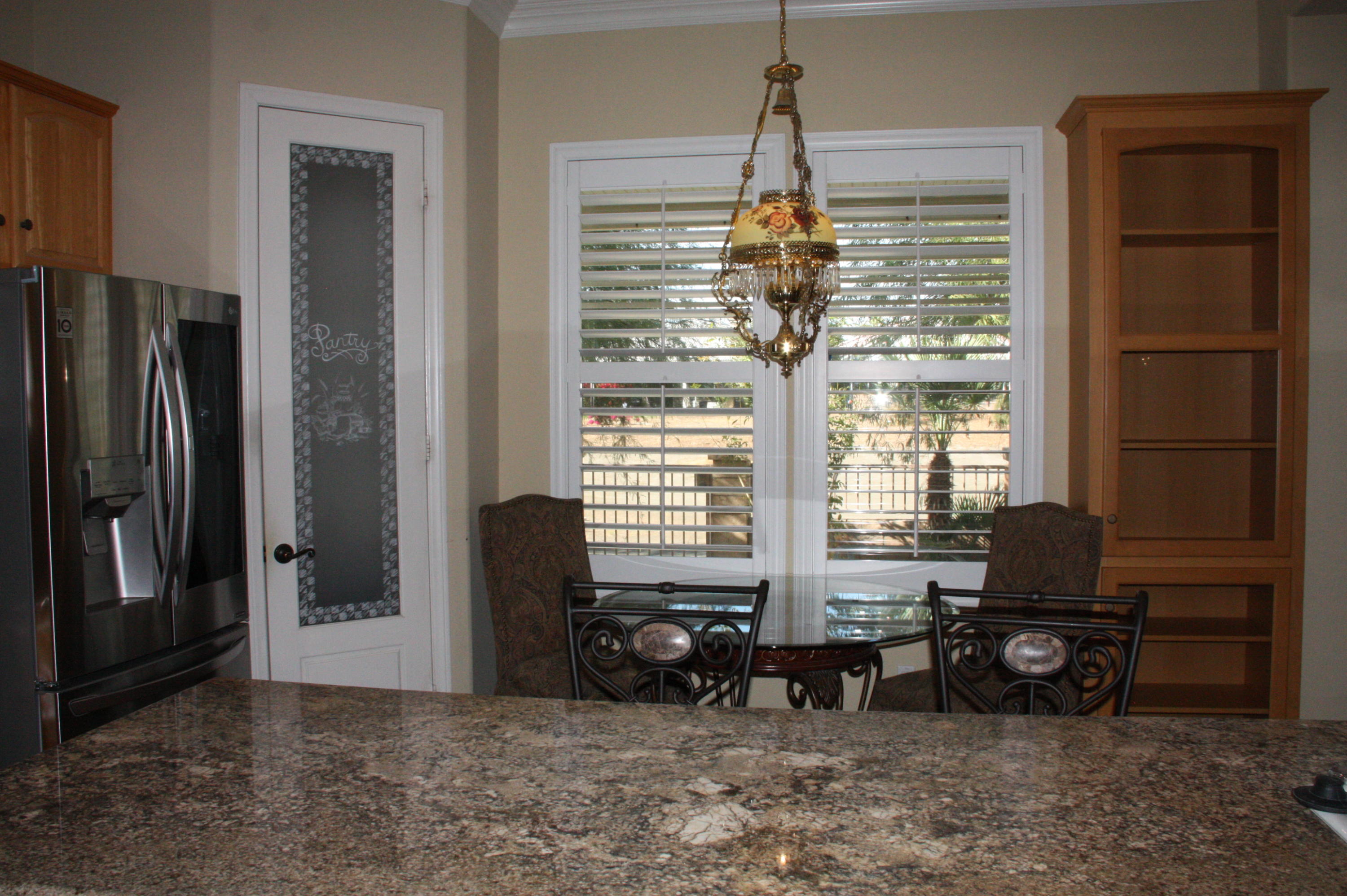 49475 Redford Way Indio, CA 92201 - Photo 28 of 58 a living room with furniture and a window