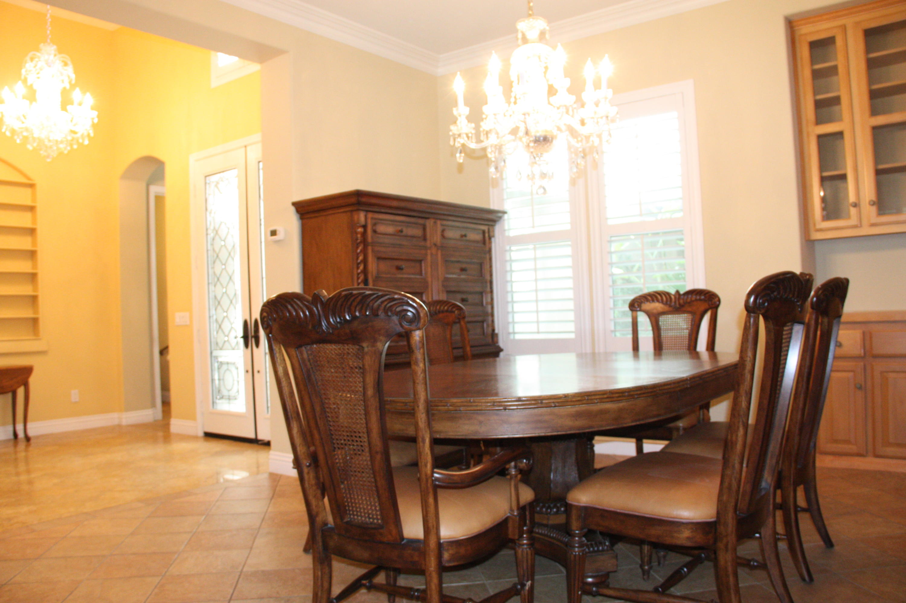 49475 Redford Way Indio, CA 92201 - Photo 29 of 58 a view of a dining room with furniture and window