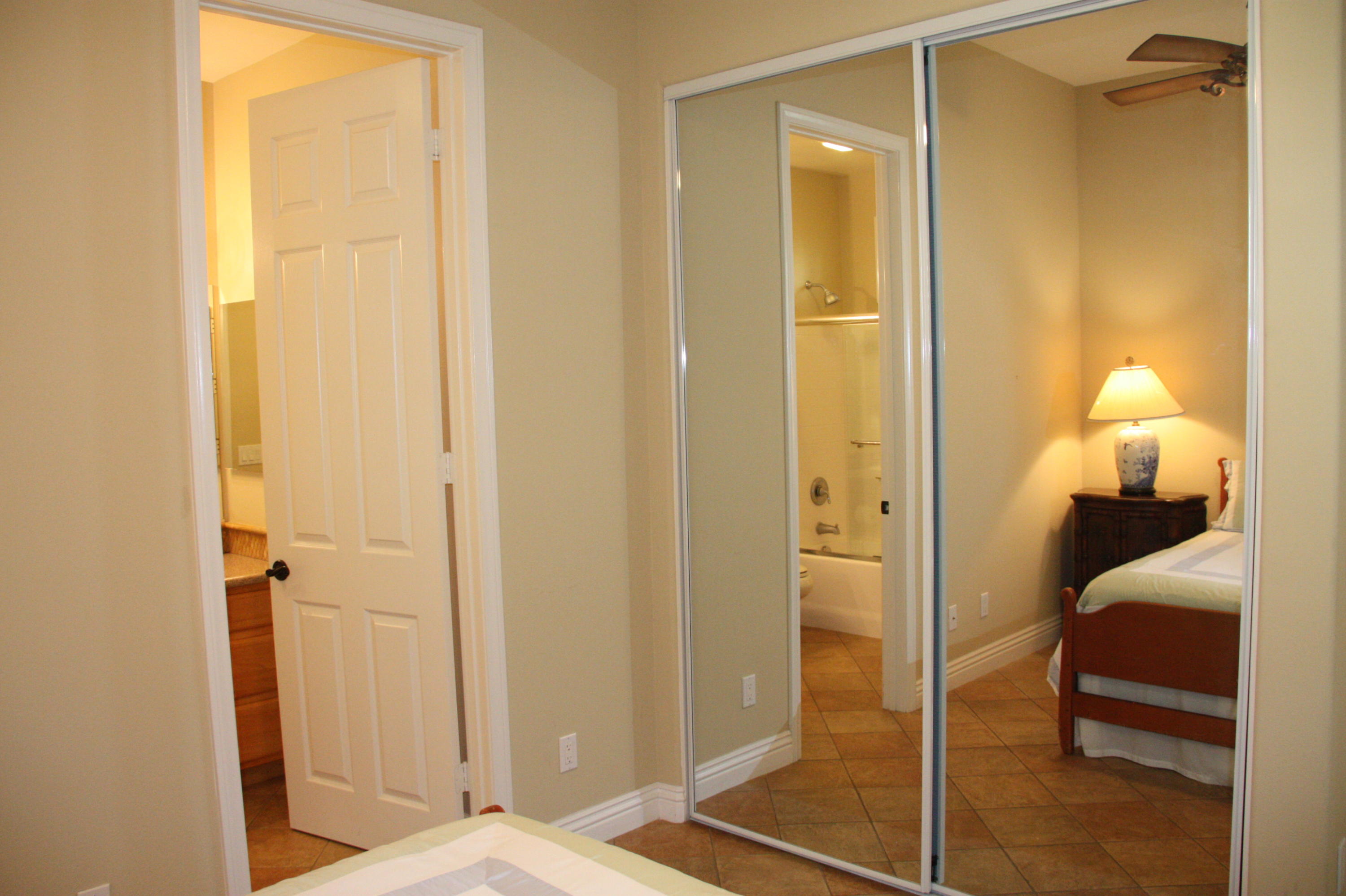 49475 Redford Way Indio, CA 92201 - Photo 48 of 58 a bedroom with a bed and a shower