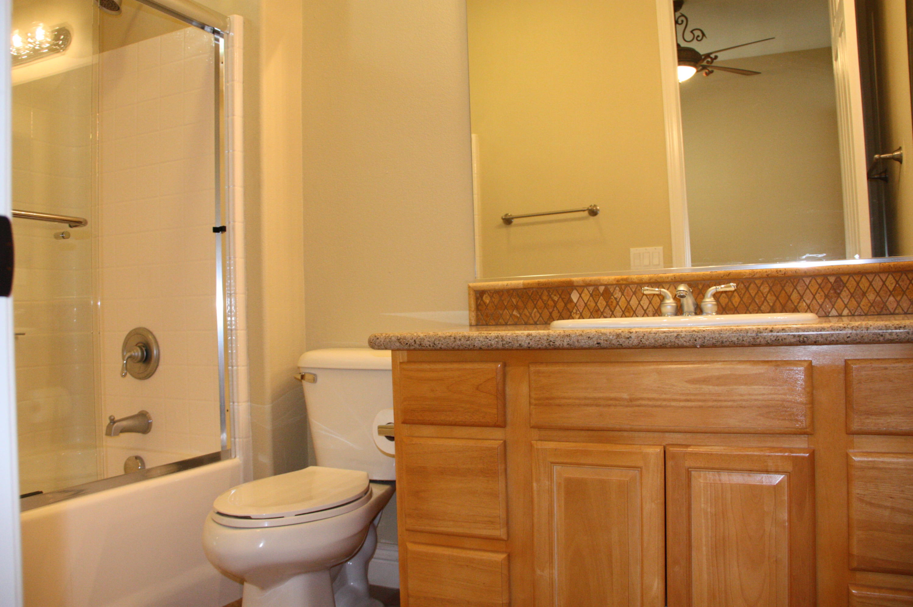 49475 Redford Way Indio, CA 92201 - Photo 50 of 58 a bathroom with a sink and a mirror