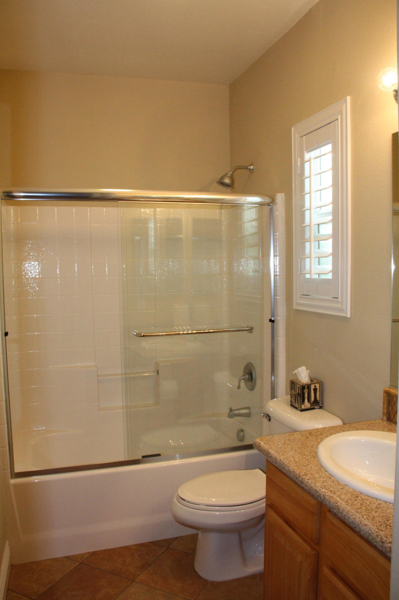 49475 Redford Way Indio, CA 92201 - Photo 55 of 58 a bathroom with a granite countertop sink toilet and shower