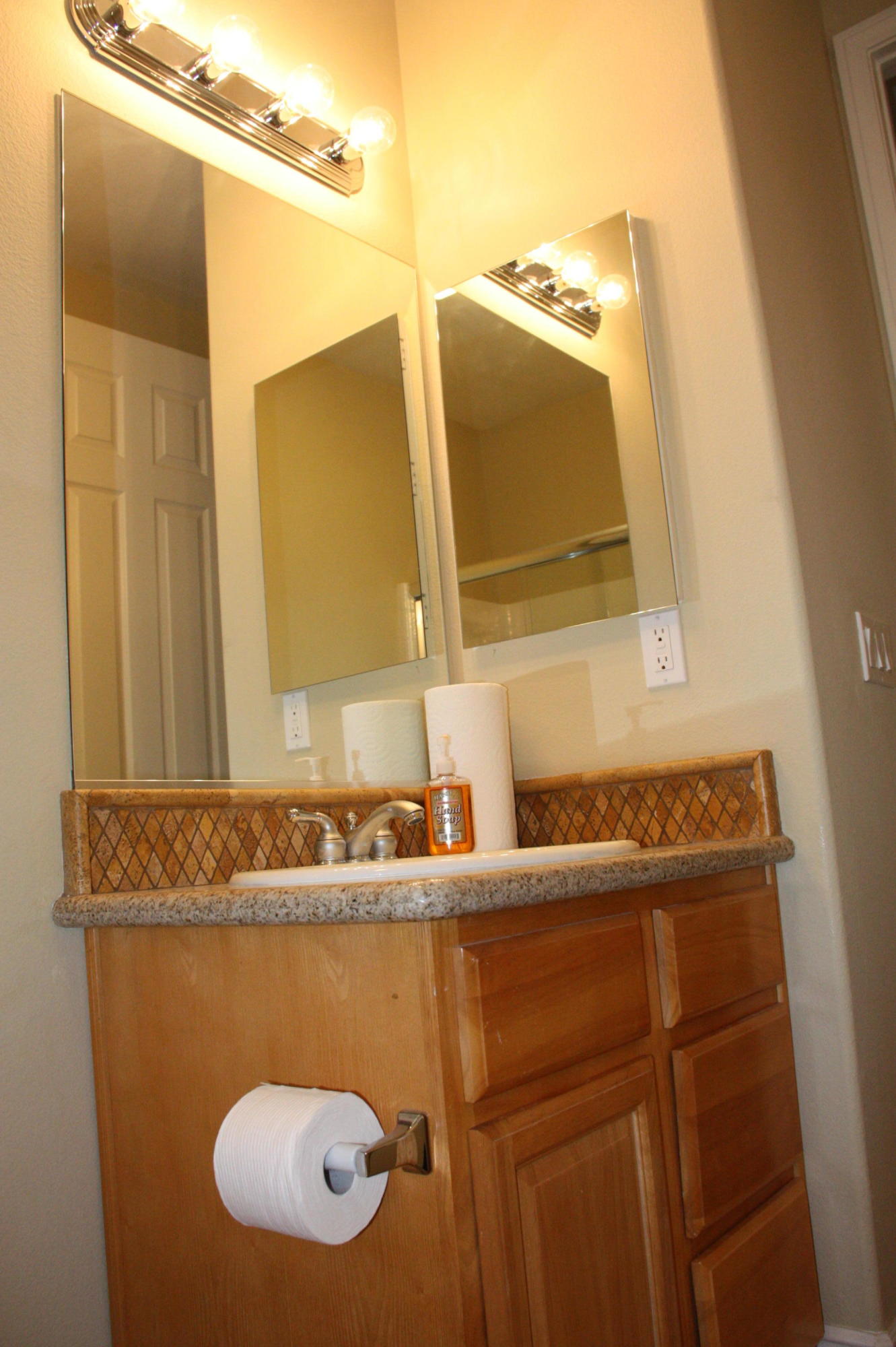 49475 Redford Way Indio, CA 92201 - Photo 56 of 58 a bathroom with a sink and mirror