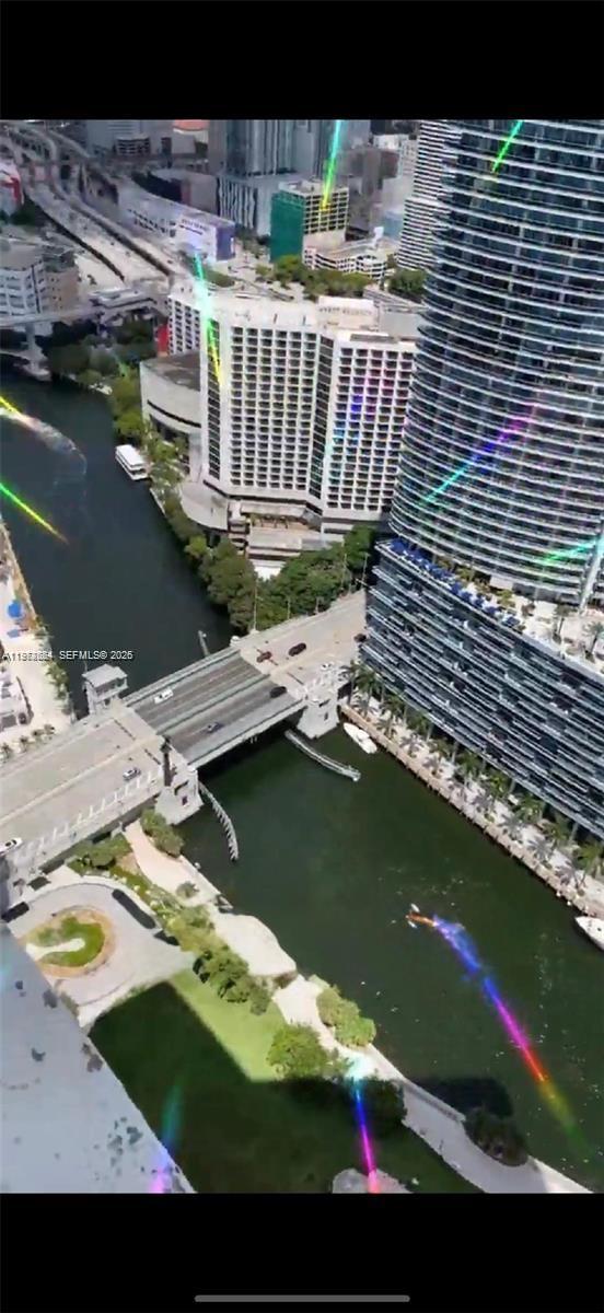 475 Brickell Avenue, Unit 4910 Miami, FL 33131 - Photo 12 of 25 a view of balcony with wooden floor