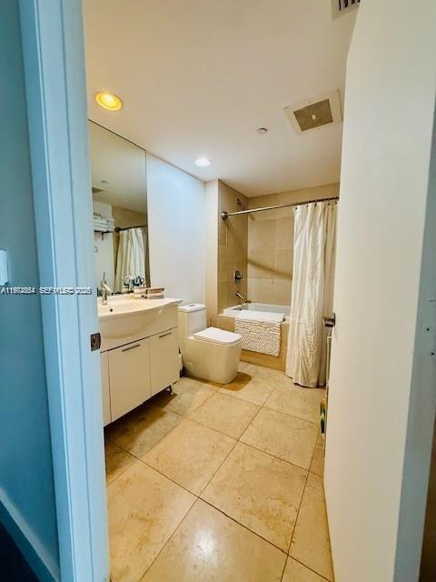 475 Brickell Avenue, Unit 4910 Miami, FL 33131 - Photo 3 of 25 a bathroom with a sink mirror and vanity