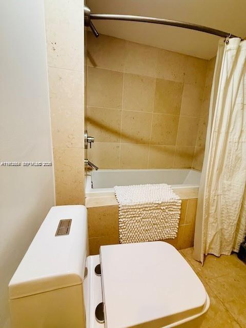 475 Brickell Avenue, Unit 4910 Miami, FL 33131 - Photo 4 of 25 a bathroom with a bathtub and shower