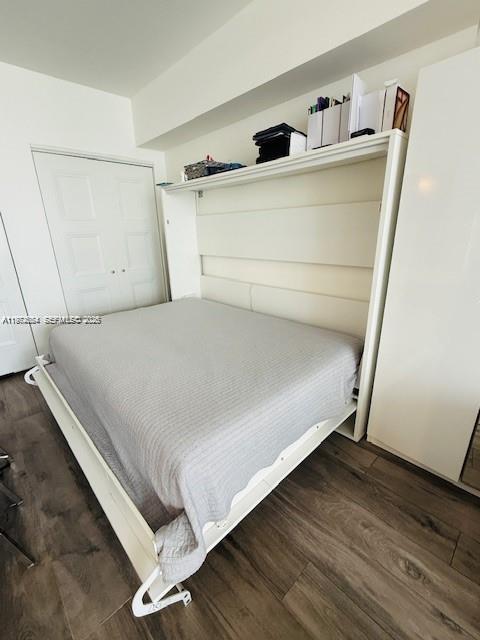 475 Brickell Avenue, Unit 4910 Miami, FL 33131 - Photo 9 of 25 a bed sitting in a room