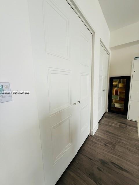 475 Brickell Avenue, Unit 4910 Miami, FL 33131 - Photo 10 of 25 a view of a hallway with wooden floor