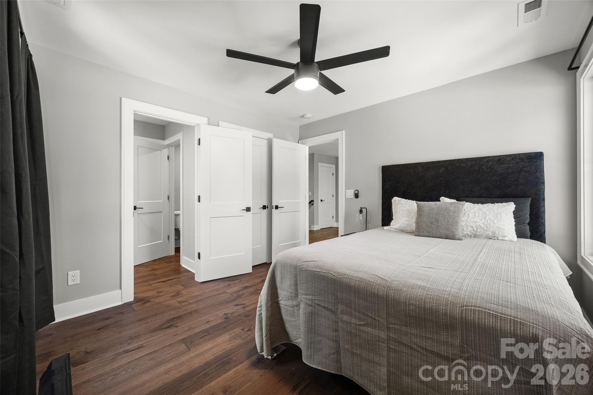 5438 Ralph Harper Lane Clover, SC 29710 - Photo 25 of 28 a bedroom with a bed and a glass door