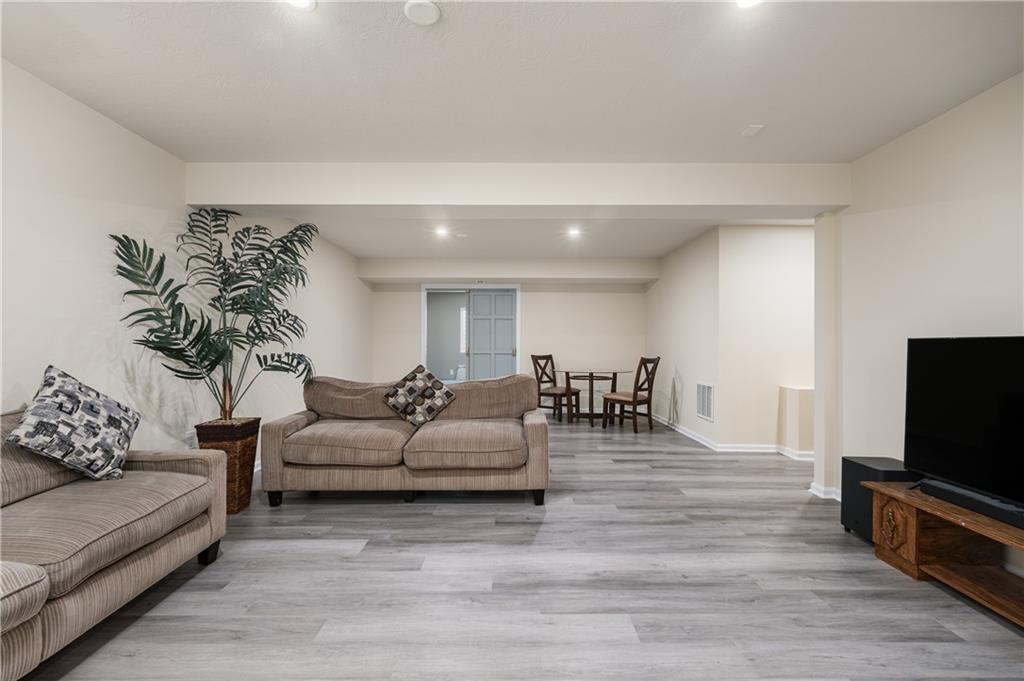 203 Ledge Rock Lane Mars, PA 16046 - Photo 25 of 33 a living room with furniture and a flat screen tv