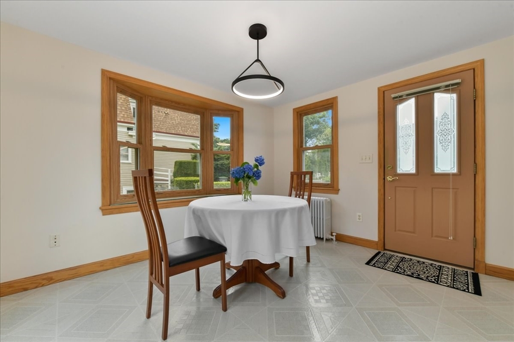 102 Border Street Dedham, MA 02026 - Photo 15 of 34 a view of a dining room with furniture window and outside view