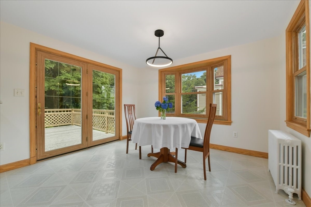 102 Border Street Dedham, MA 02026 - Photo 16 of 34 a dining room with furniture and windows