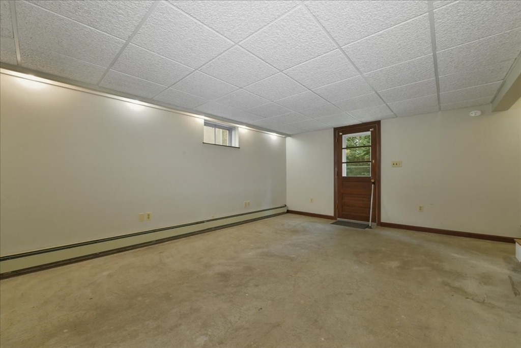 102 Border Street Dedham, MA 02026 - Photo 25 of 34 an empty room with a empty space and windows