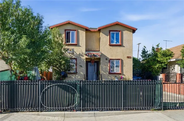 a car parked in front of a house
