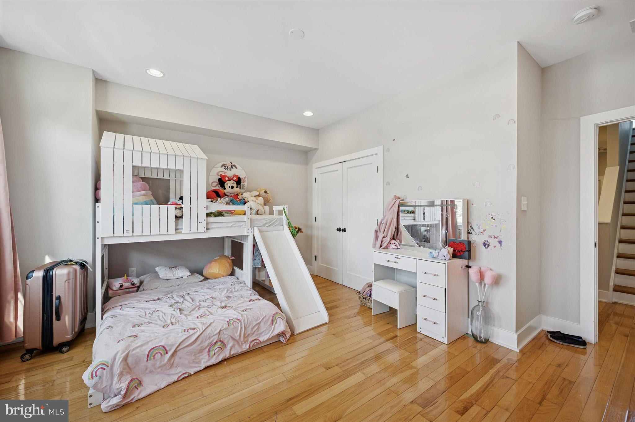 4743 Sheldon Street Philadelphia, PA 19127 - Photo 9 of 18 a bedroom with a bed and wooden floor