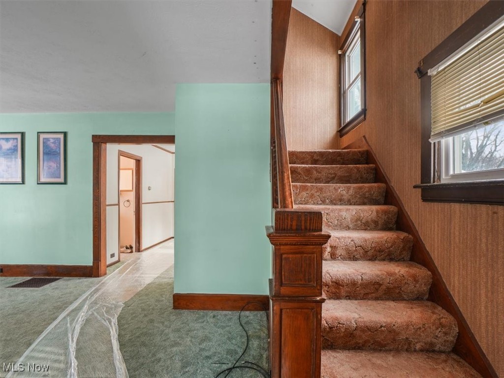 5800 Granger Road Ashtabula, OH 44004 - Photo 7 of 32 Staircase featuring carpet floors