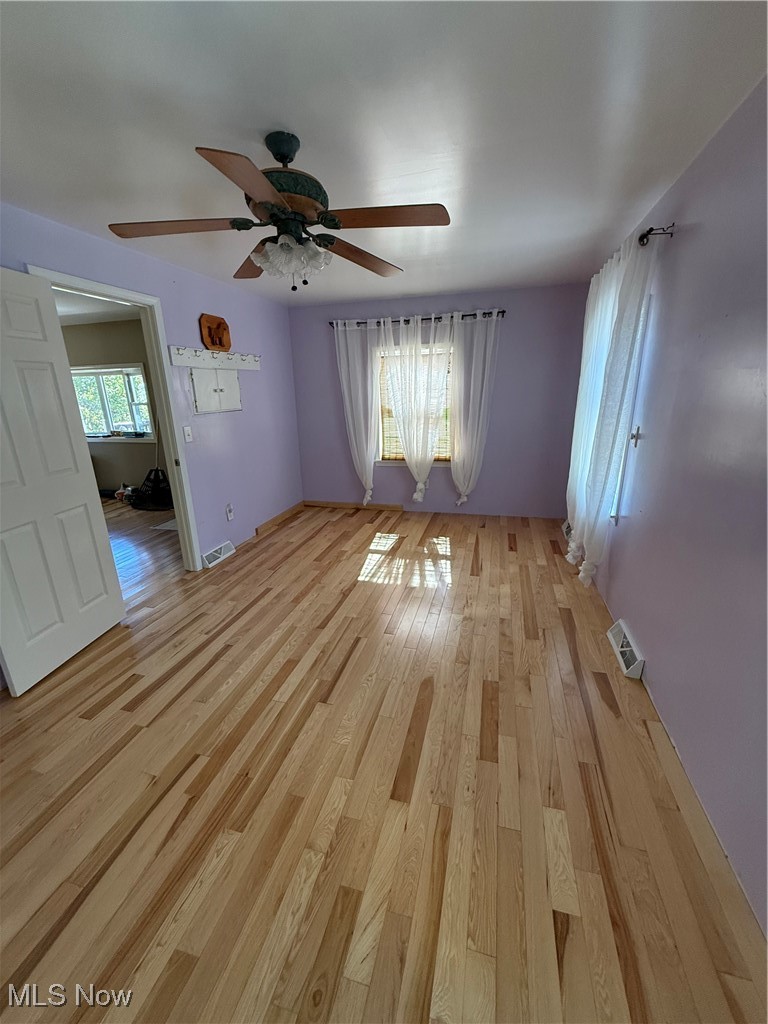 978 Center Road East Liverpool, OH 43920 - Photo 8 of 14 Spare room with light wood-style flooring and a ceiling fan