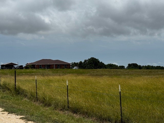 a view of a lake in middle of the house