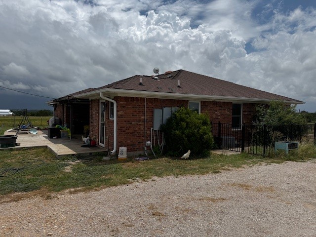 1600 Cr-251 Road Georgetown, TX 78633 - Photo 2 of 12 a front view of a house with garden
