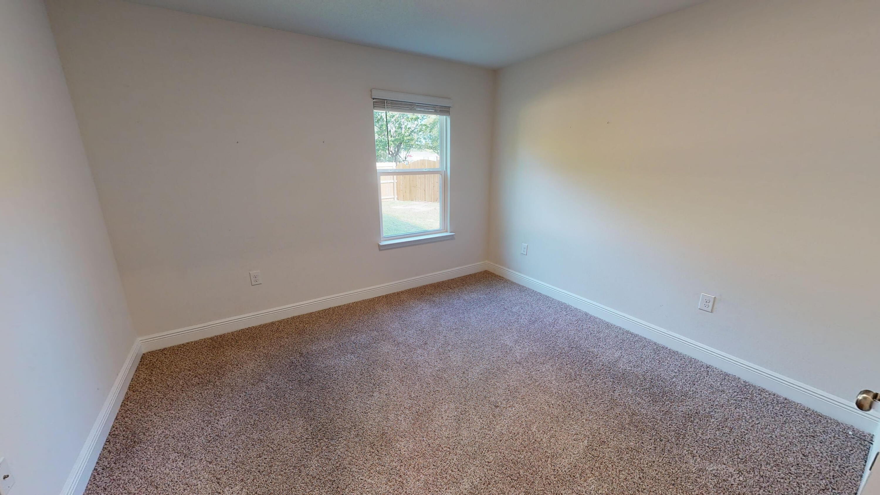 3139 Heritage Oaks Circle Navarre, FL 32566 - Photo 13 of 34 an empty room with a window