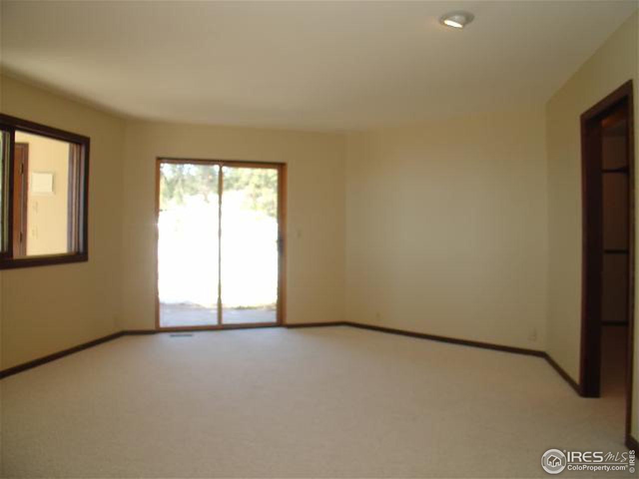 773 Sky Trail Road Boulder, CO 80302 - Photo 11 of 18 an empty room with windows