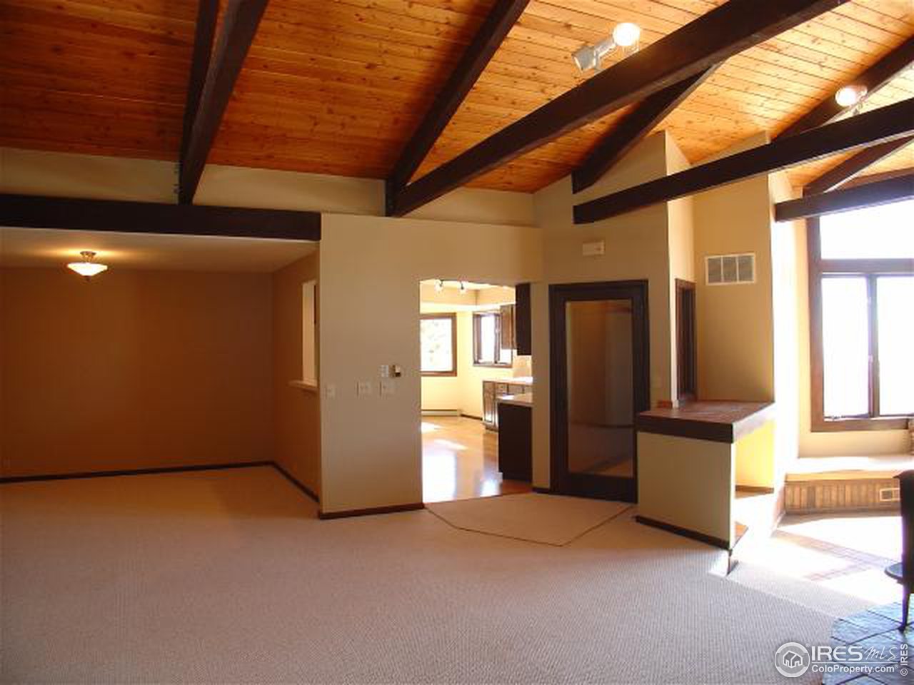 773 Sky Trail Road Boulder, CO 80302 - Photo 9 of 18 a view of an empty room with a window