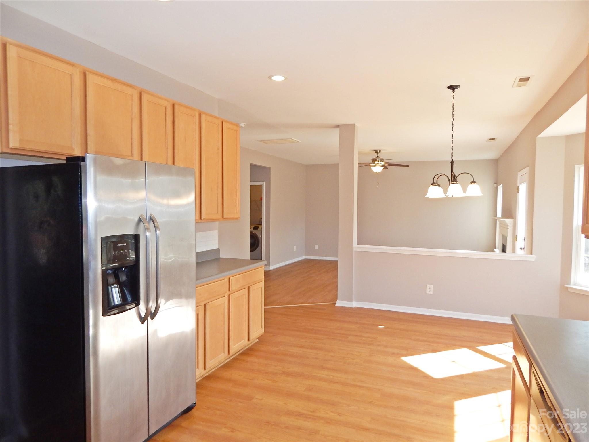 651 Fall Line Way Rock Hill, SC 29730 - Photo 11 of 25 a kitchen with stainless steel appliances granite countertop a refrigerator and a sink